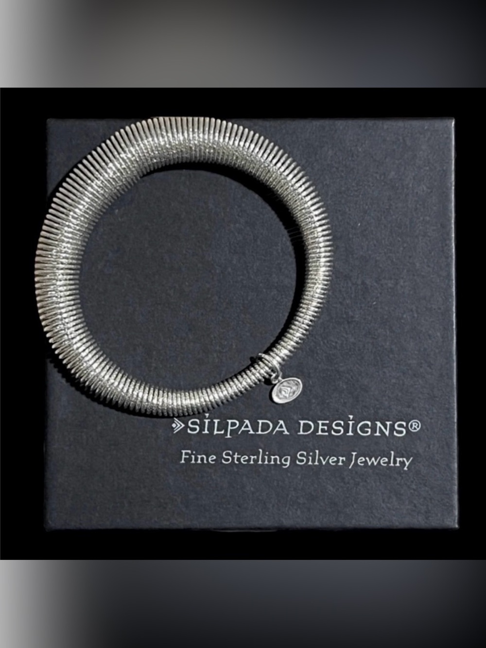 Retired Silpada sterling silver diamond cut spring coil bangle bracelet B3208
